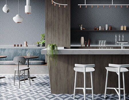 Wnętrze z wykończeniami architektonicznymi 3M: niebieski i imitacje kamienia i drewna.
