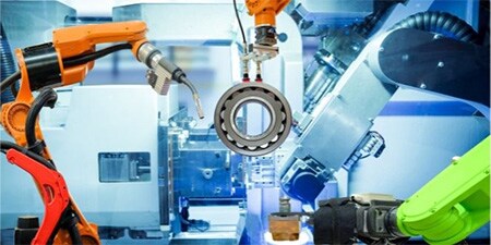 Stylizowany obraz przedstawiający maszyny do automatyzacji produkcji.
