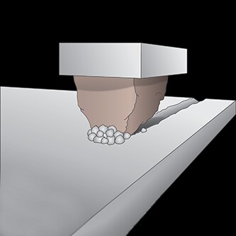 Ilustracja z rozdrobnionym ziarnem ceramicznym
