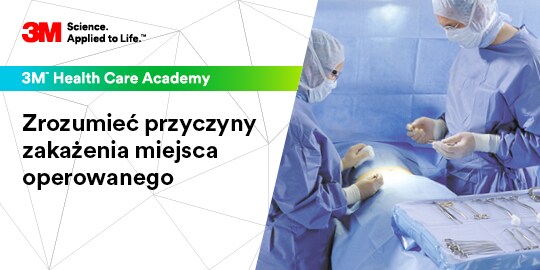 Chirurg i asystent operujący pacjenta
